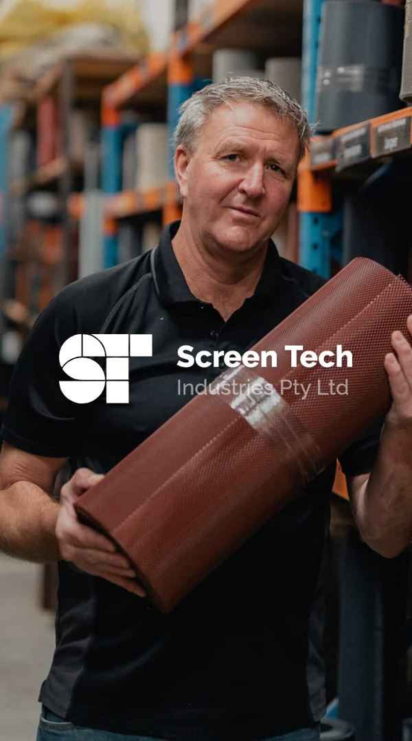 Screen Tech team member holding gutter guard mesh, from the Screen Tech website project by Net Search